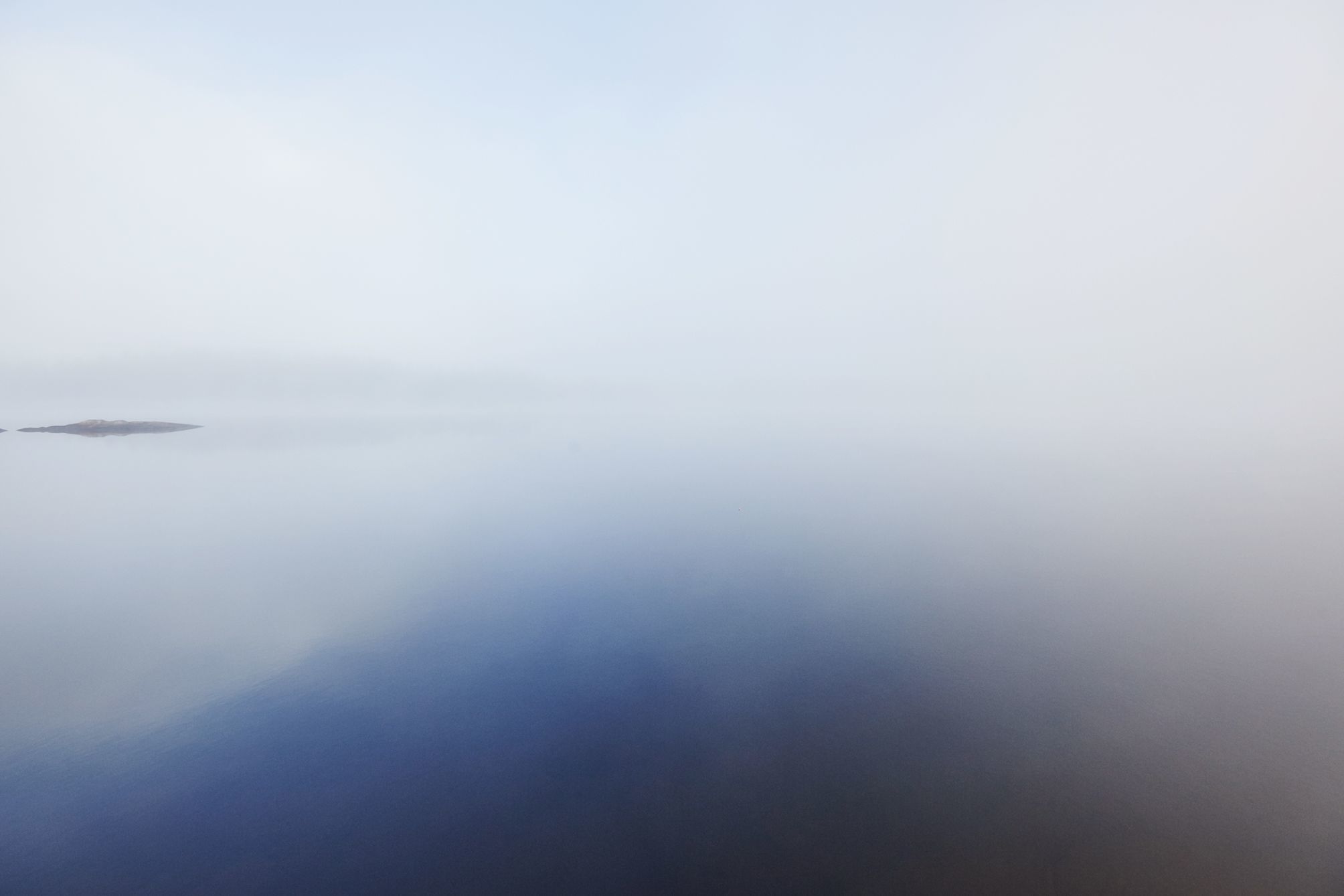 Misty image of a lake at dawn