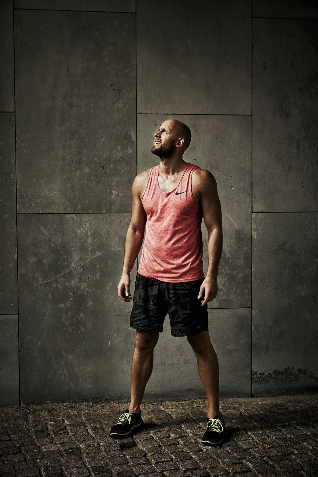 Fitness trainer showing some fitness routines on a bench in Berlin