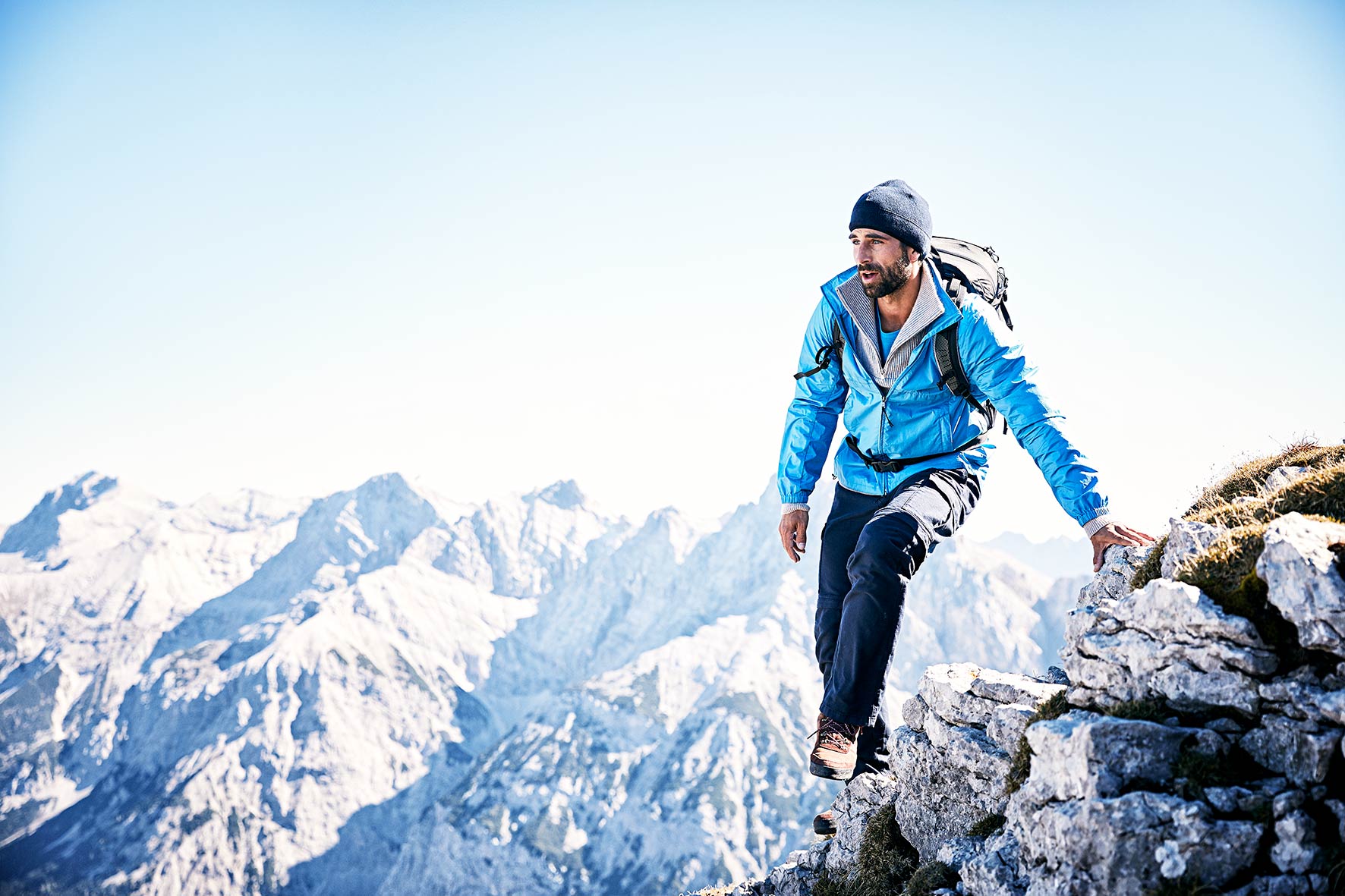 Sports pic showing a man hiking in the alps