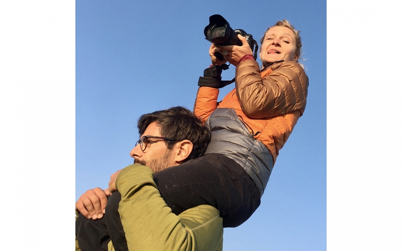 Jessica Zumpfe on the shoulders of her assistant on a catalogue shoot for TATONKA