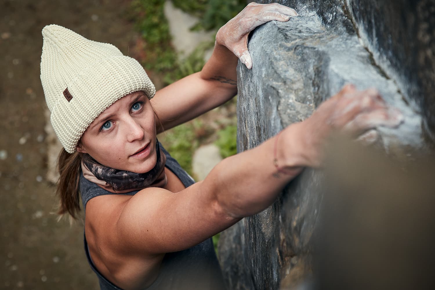 Elena pulling herself into a climbing route in Zillertal