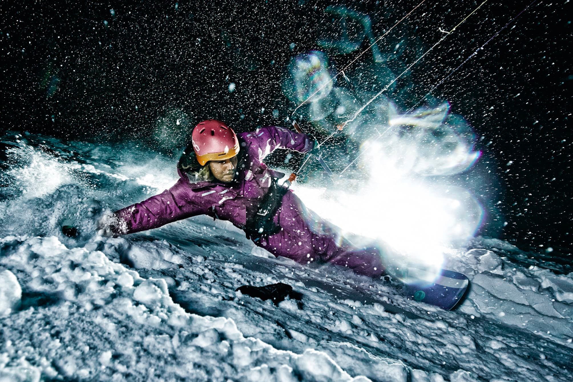 Snowkite champion Benjamin Näther jumping in the snow